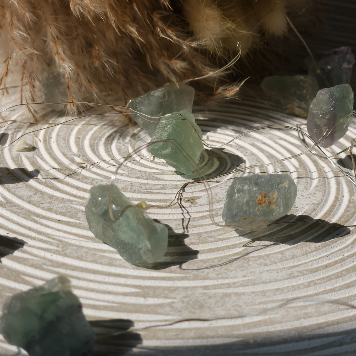 Nefrito brangakmenių švieselės