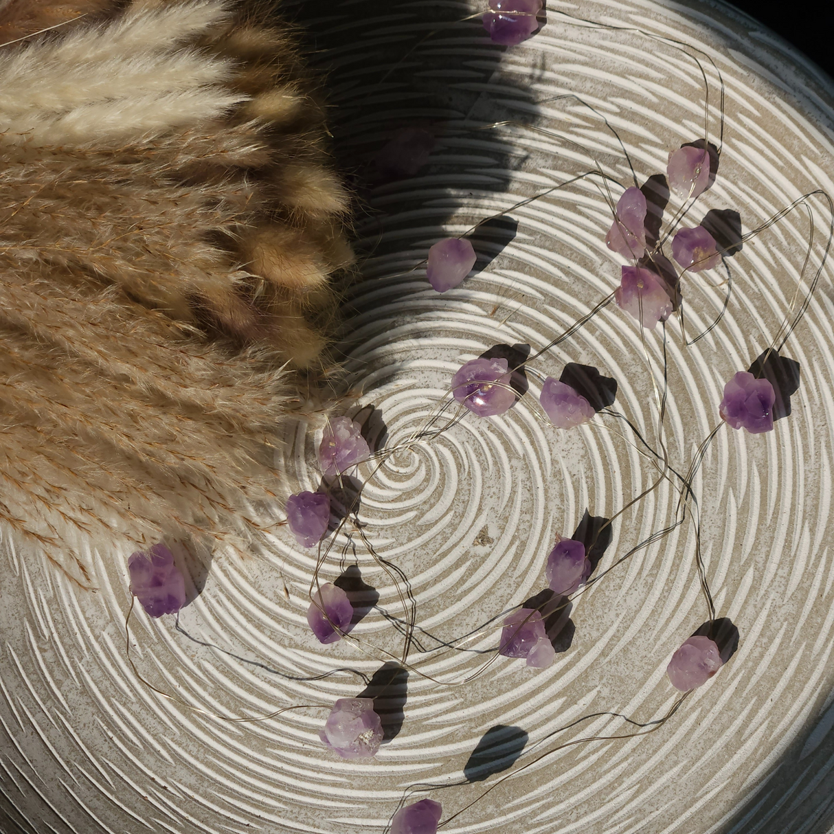 Ametisto brangakmenių švieselės