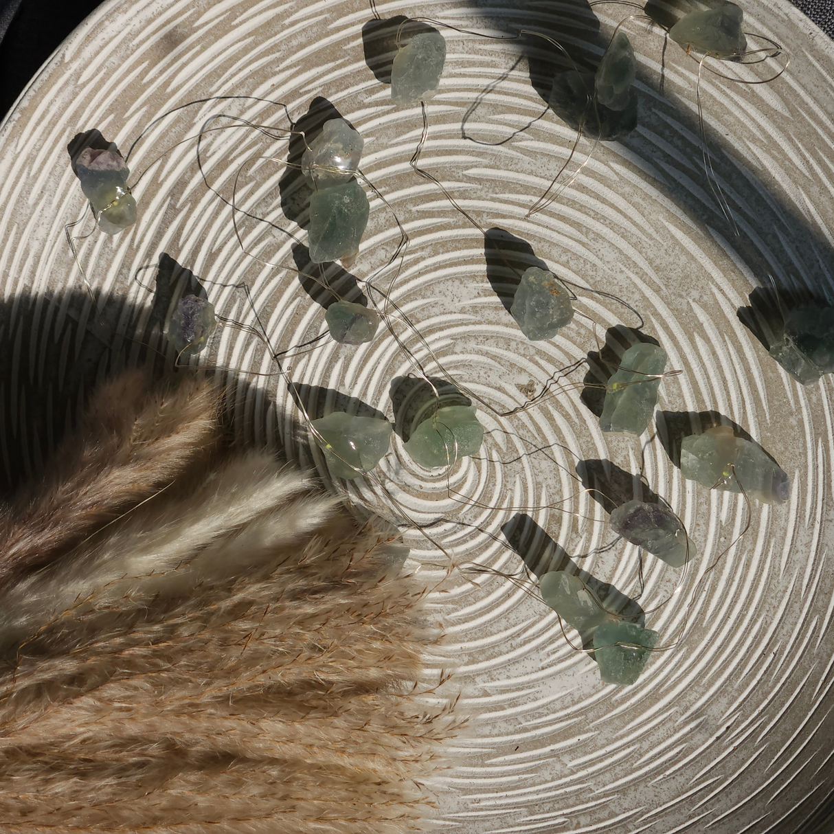 Nefrito brangakmenių švieselės