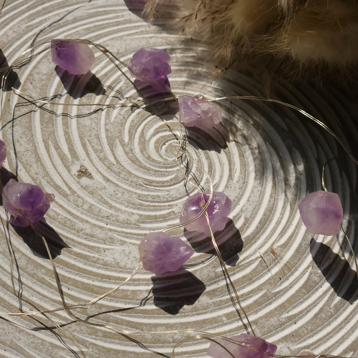 Ametisto brangakmenių švieselės