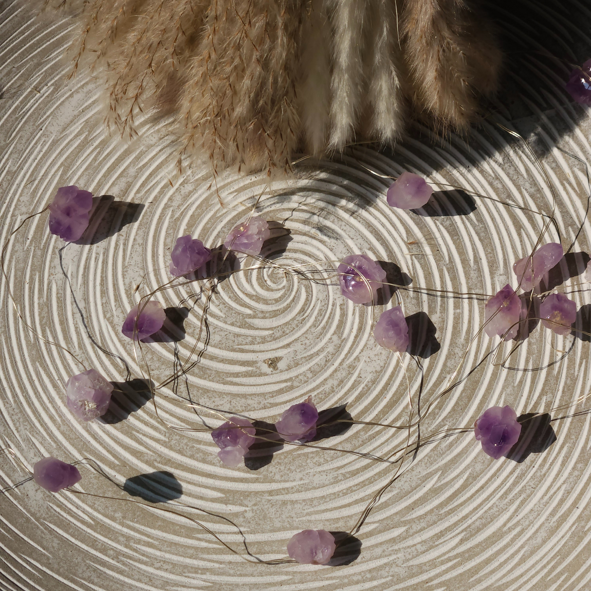 Ametisto brangakmenių švieselės