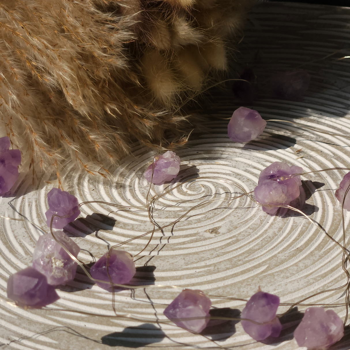 Ametisto brangakmenių švieselės