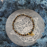 Briaunuota granato/hematito apyrankė